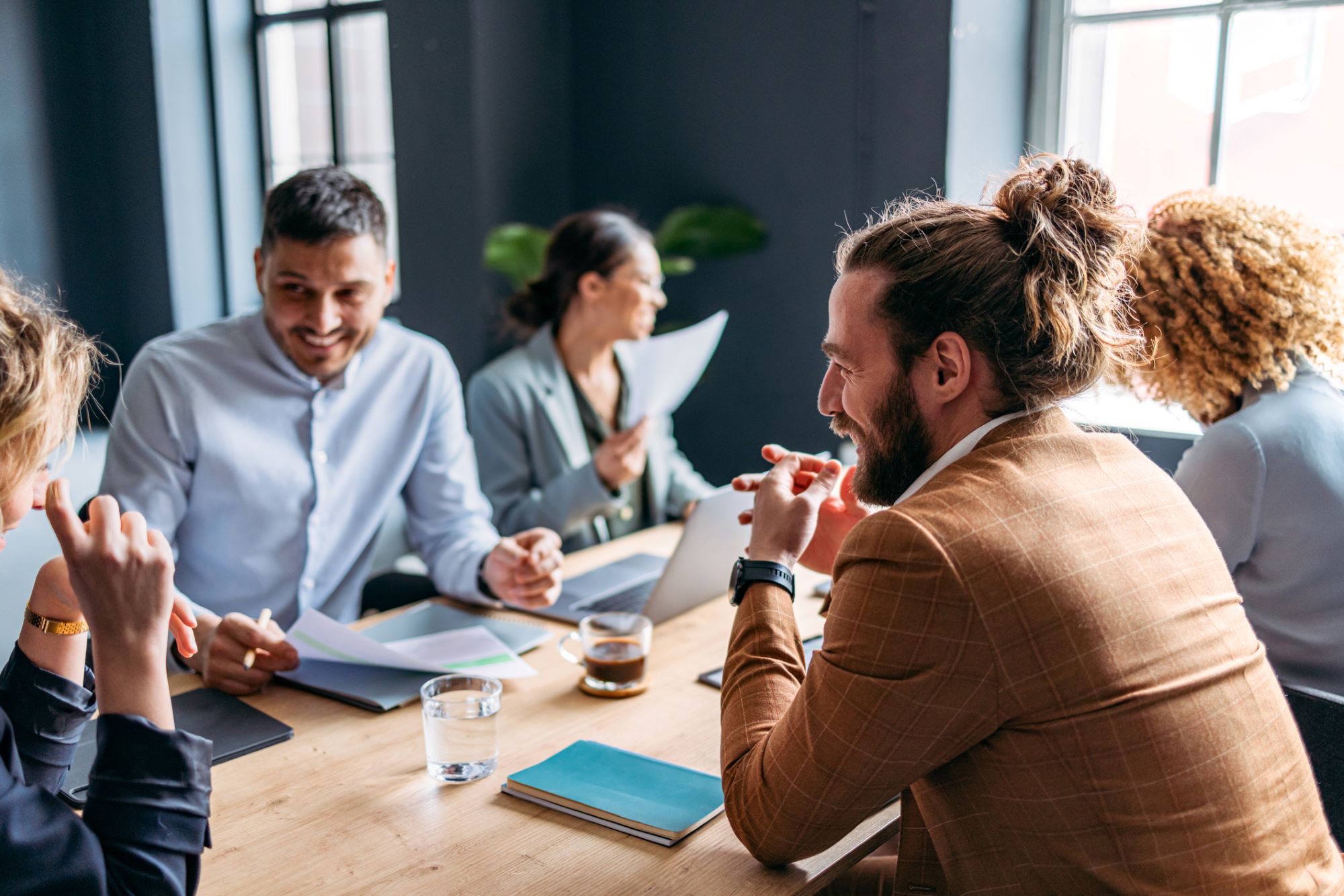 team of investors coordinating an acquisition